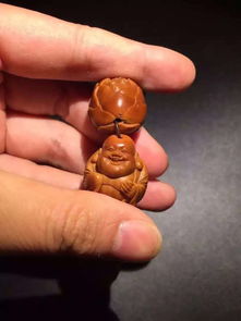 橄榄核雕作为一种艺术创作,题材和主题选择很重要