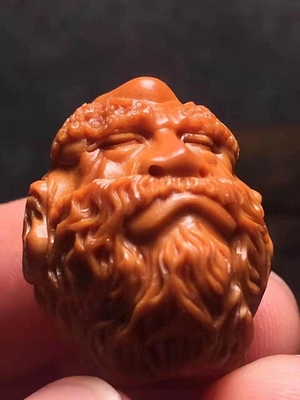 《达摩八祖》:须华青大师的橄榄核雕艺术之作
