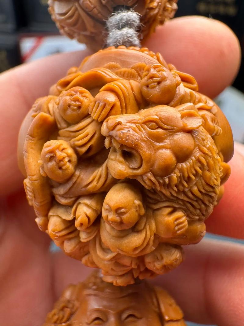 骑兽百子财神.中国核雕艺术收藏品.#非物质文化遗产 #高端的
