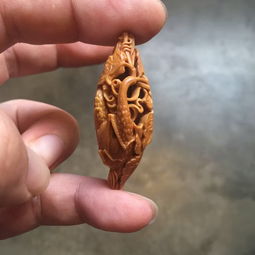 了解一下橄榄核雕艺术家的创作颠峰期是在什么时期