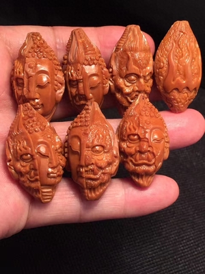 亲民心的橄榄核雕作品的艺术价值